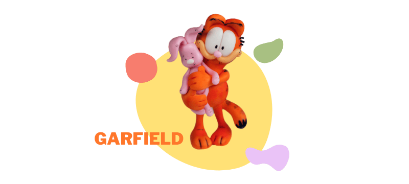 Garfield the orange cat, made of fondant, hugging a pink stuffed animal, stands on a yellow circle background with colorful shapes around—perfect as an adorable cake topper.