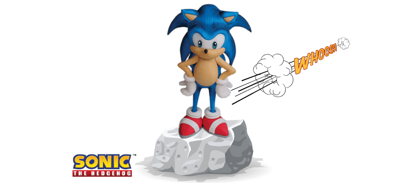 Sonic the Hedgehog stands confidently on a rock with "WHOOSH!" text beside him, resembling an awesome fondant cake topper. The Sonic logo is in the bottom left corner.