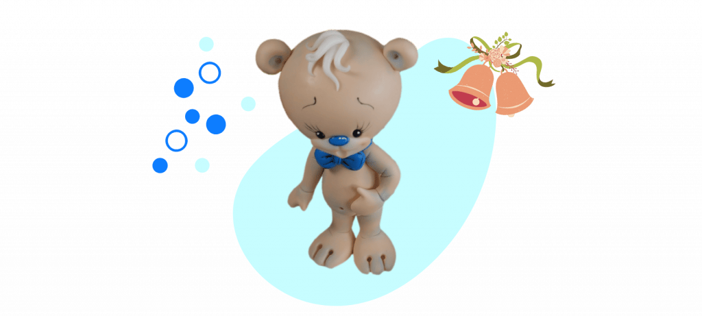 Cartoon teddy bear with a blue bowtie on a blue background with bells and polka dots, perfect as a fondant cake topper.