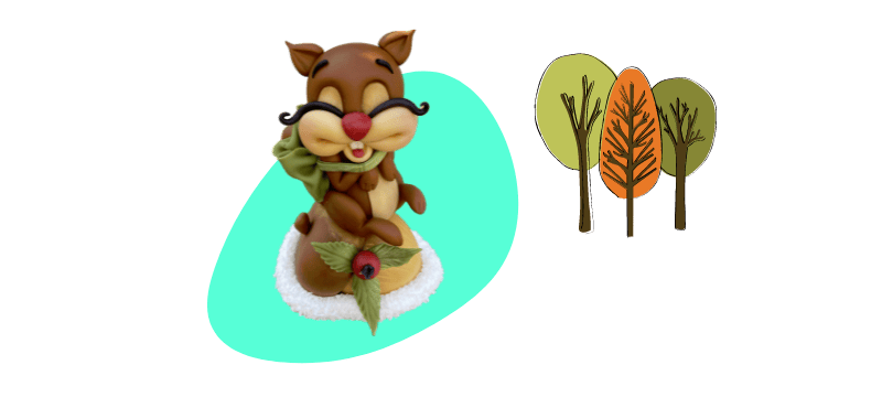 A clay figurine of a smiling chipmunk with a green scarf stands next to stylized trees on a teal background, resembling an adorable fondant cake topper.