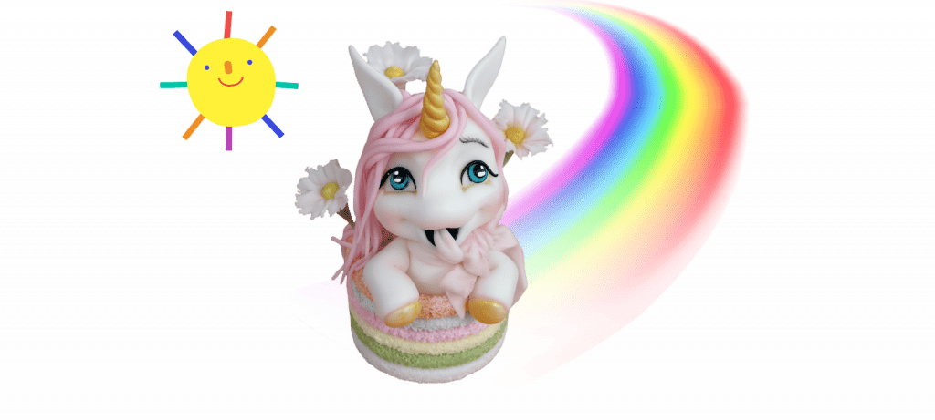 A cute little unicorn with a pink mane, surrounded by flowers, sits on a colorful rainbow cake. A smiling sun is in the background, making it perfect as a fondant cake topper.