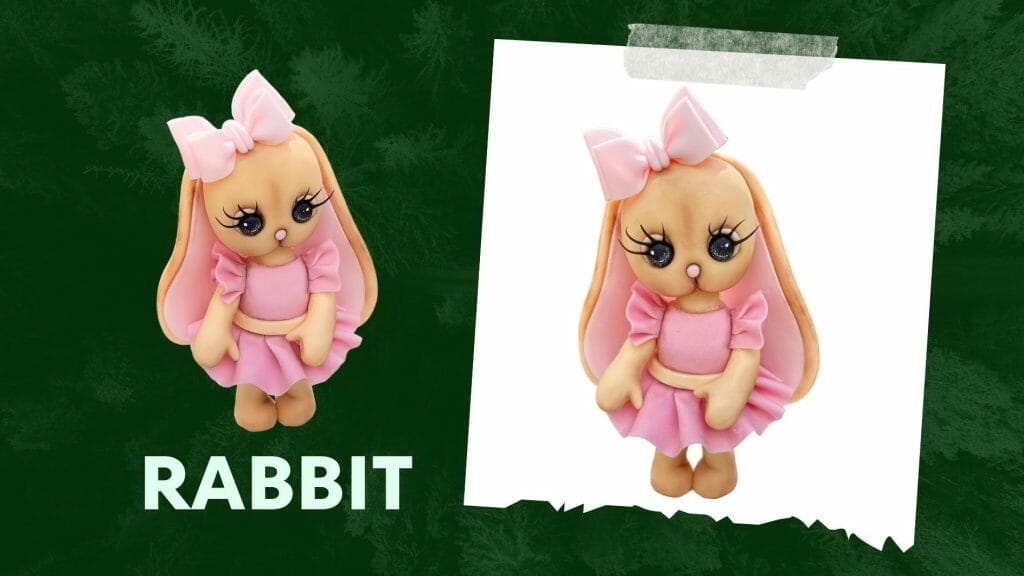 A cute, cartoonish rabbit with long ears, pink bows, and a pink dress, set against a green background with "RABBIT" written below—a perfect fondant cake topper for beginners.